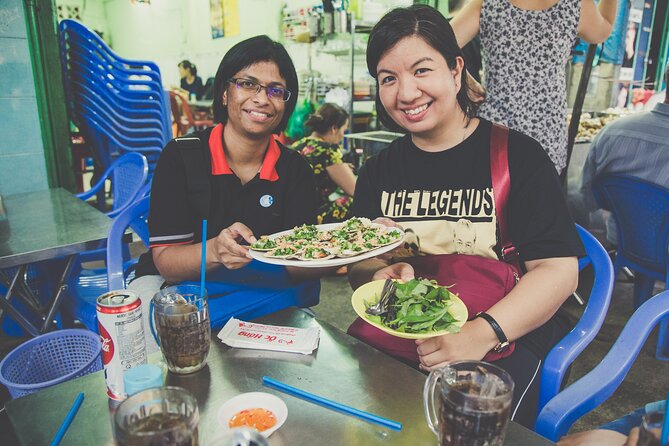 Walking Street Food Evening Safari with 20 tastings - District 3 and District 10 by Night: Alleyway Eating Made Easy