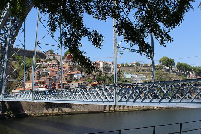 Wine Tasting with Tapas Walking Tour in Porto - Ribeira do Porto stroll: a guided look at the riverside trade story