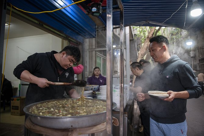 Xi'an Evening Food Tour by TukTuk - Riding a tuk-tuk through Xi’an’s narrow lanes