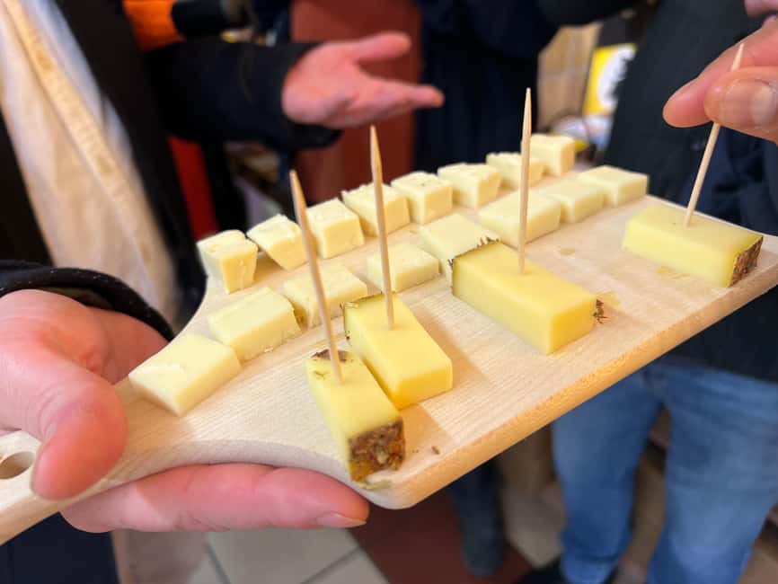 Zurich: Food Tour of 8+ Tastings with Cheeses & Chocolates - Rösti and creamy meat stew with local wine: Swiss comfort in one plate